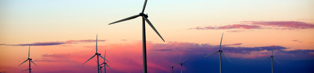 Wind turbines at sunset